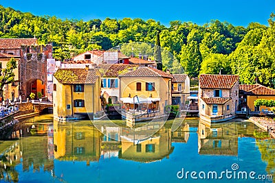 Mincio river and idyllic village of Borghetto view Stock Photo