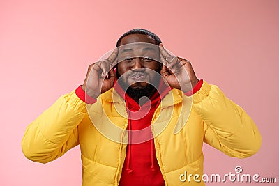 Mind blowing information. Portrait playful charismatic carefree african bearded young 25s man pouting hold breath Stock Photo