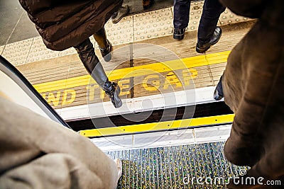 MInd the gap yellow sing in London Tube underground metro Editorial Stock Photo