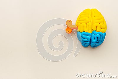 Mindfulness concept. Brain model with key as symbol of mental power Stock Photo