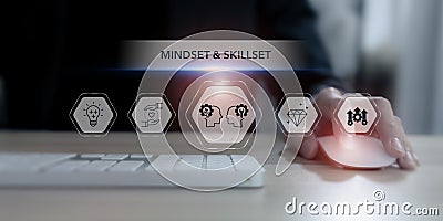 Mindset and skillset development concept. Using computer and virtual screen with icons representing mindset and skillset. Stock Photo