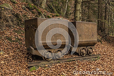 Mine carts near Cerny Dul village in autumn day Stock Photo