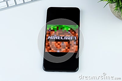 Minecraft app logo on a smartphone screen. Editorial Stock Photo