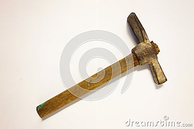 Miner hammer like pickaxe or mattock on white isolated background with shadow. Closeup view of rustic old hand tool for hard Stock Photo