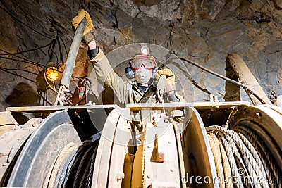 Miner inside a gold mine. Editorial Stock Photo