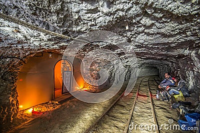Miner in the underground mine with light in mine Stebnyk, Ukraine Editorial Stock Photo