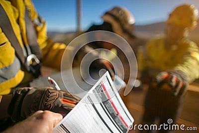 Miner workers are signing of the permit on the opening field Stock Photo