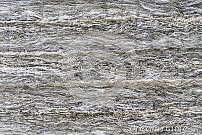 Mineral fiberglass is laid out in several layers. Fiberglass background Stock Photo
