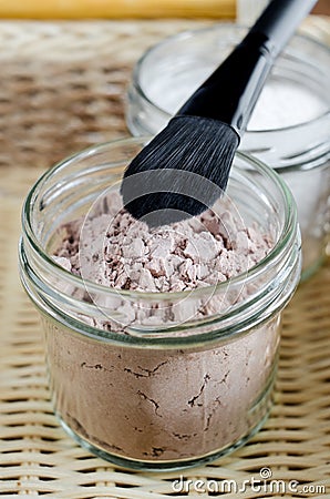 Mineral homemade powder foundation or dry shampoo in a grass jar. DIY cosmetics. Close up, copy space. Stock Photo