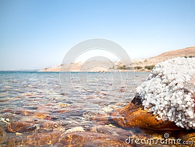 Mineral salts on coast of the Dead Sea Stock Photo