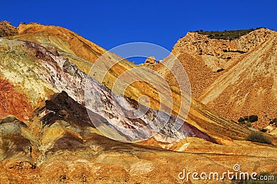 Mineral streaks and sediments in a old abandoned quarry Stock Photo
