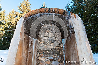 Mineral water fountain builded with concrete and stone Stock Photo