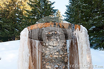 Mineral water fountain builded with concrete and stone Stock Photo