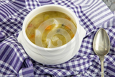 Minestrone, italian vegetable soup with served Turkish ravioli on gray backgrounds Stock Photo