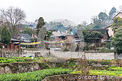Ming Qing Dynasty Chinese traditional rural house, built with black tiles, stone, and bricks, in Qingyan Ancient town, one of Stock Photo