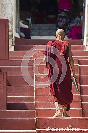 The Mingun Pahtodawgyi and a monk Editorial Stock Photo