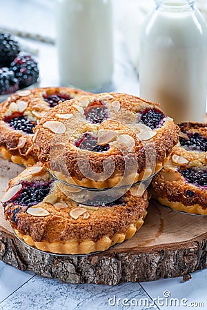 Mini blackberry bakewell tarts Stock Photo