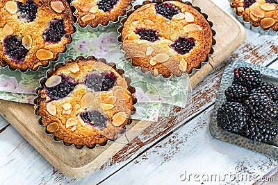 Mini blackberry bakewell tarts Stock Photo