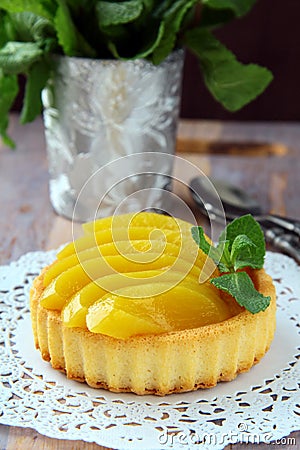 Mini cake with cream and peach Stock Photo