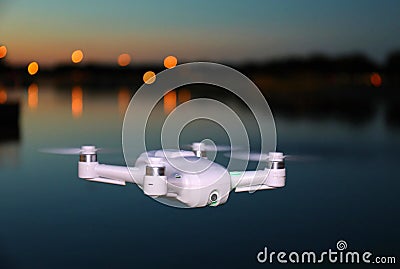 Small Camera Drone Flying (Evening Picture) Stock Photo