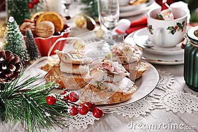 Mini canapes with herring and pickled ginger and onion in oil for Christmas Stock Photo