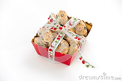 Mini Christstollen in a red tray with ribbon Stock Photo