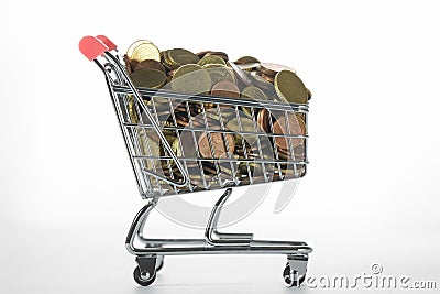 Mini Chrome Shopping Cart Filled To the Top With Coins Stock Photo