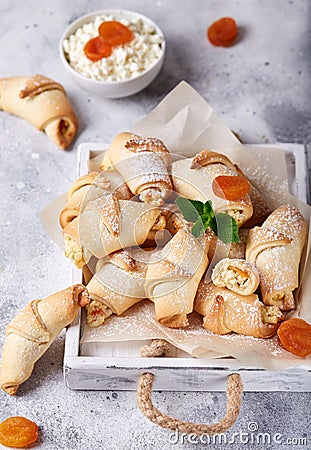 Mini croissant cookies with cottage cheese and dried apricots Stock Photo