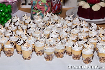 Mini desserts in individual portions for guests at the reception Stock Photo