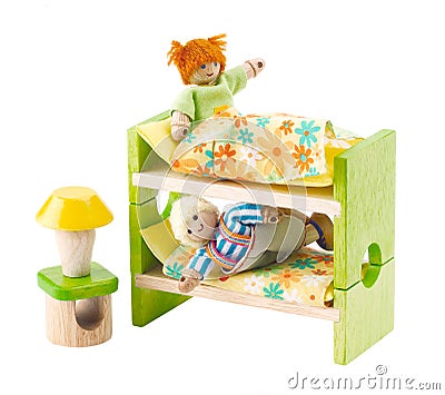 Mini dolls and dormitory bedroom Stock Photo