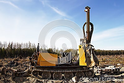 Mini-drilling rig on crawler track Editorial Stock Photo
