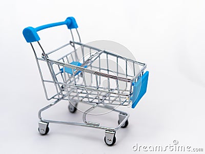 Mini empty grocery cart isolated on white background Stock Photo