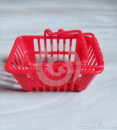 Mini empty red basket Stock Photo