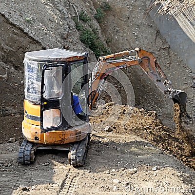 Mini excavator Stock Photo