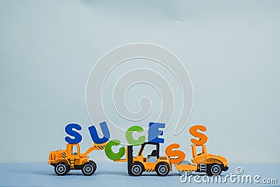 Mini forklift bulldozer truck and road roller machine with text Stock Photo