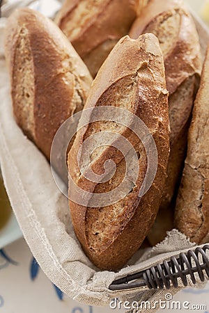 Mini french baguette in vintage basket Stock Photo