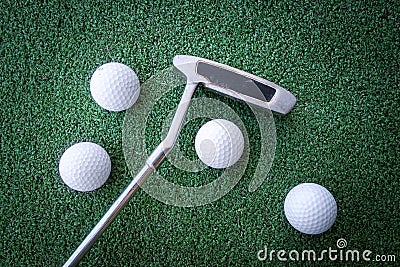 Mini golf scene with ball and club Stock Photo