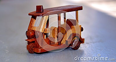 Mini handmade wooden Thai tricycle Stock Photo