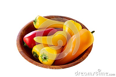 Mini multicolored peppers, in wooden cup, on white background Stock Photo