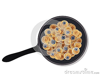 Mini pancake cereal with blueberry breakfast on the pan Stock Photo