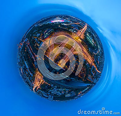 Mini planet Night Aerial view panorama of a freeway intersection traffic trails in night Moscow Stock Photo