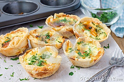 Mini quiche with bacon, using bread toast instead of dough Stock Photo