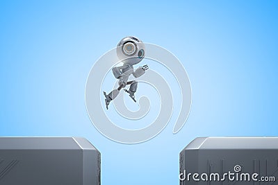 Mini robot jump across Stock Photo