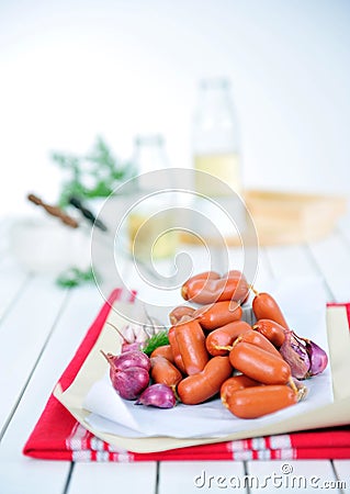 Mini sausage rolls, olives Stock Photo