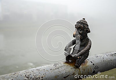 Mini sculpture of Celt on the embankment of the river Latoritsa in rainy weather Stock Photo