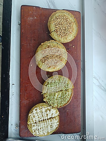 Mini sweet martabak or thin sweet crepe or pancake Stock Photo