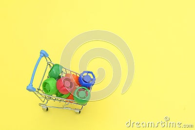 Multi-colored plastic corks from baby food, zero life-style waste, recycling garbage, environmental awareness Stock Photo