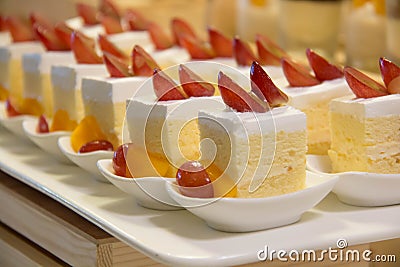 Mini vanilla cake with topping fruit Stock Photo