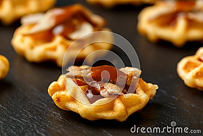 Mini waffle duck party food on rustic stone background Stock Photo