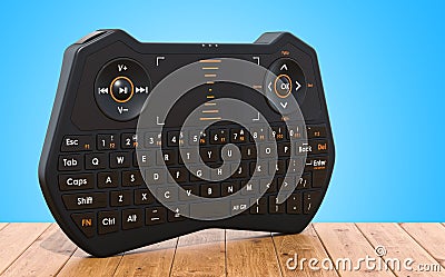Mini Wireless Bluetooth Keyboard on the wooden table, 3D rendering Stock Photo